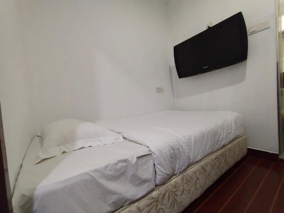 Oyo 90248 Kapitan Inn بينتولو المظهر الخارجي الصورة
